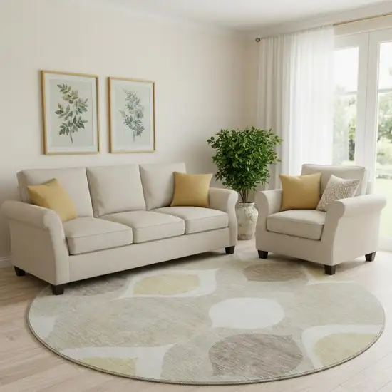 8' Beige Ivory And Gold Ogee Washable Round Rug With UV Protection Photo 1