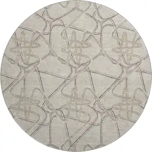 Photo of 8' Beige Ivory And Gray Geometric Washable Round Rug With UV Protection