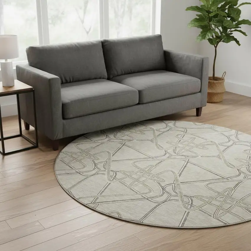 8' Beige Ivory And Gray Geometric Washable Round Rug With UV Protection Photo 2