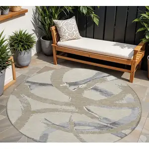 Photo of 8' Beige Ivory And Gray Round Abstract Washable Indoor Outdoor Area Rug