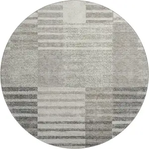 Photo of 8' Beige Ivory And Gray Striped Washable Round Rug With UV Protection