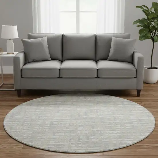 8' Beige Ivory And Silver Abstract Geometric Washable Round Rug With UV Protection Photo 2