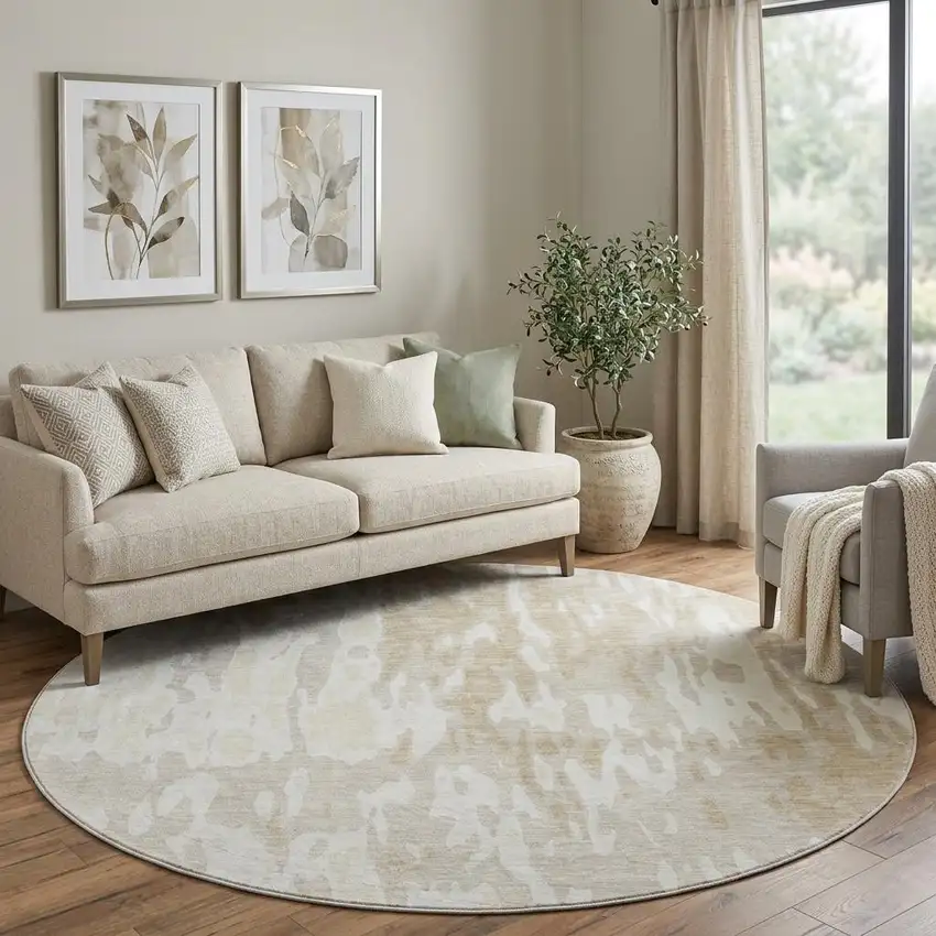 8' Beige Ivory And Tan Abstract Washable Round Rug With UV Protection Photo 1