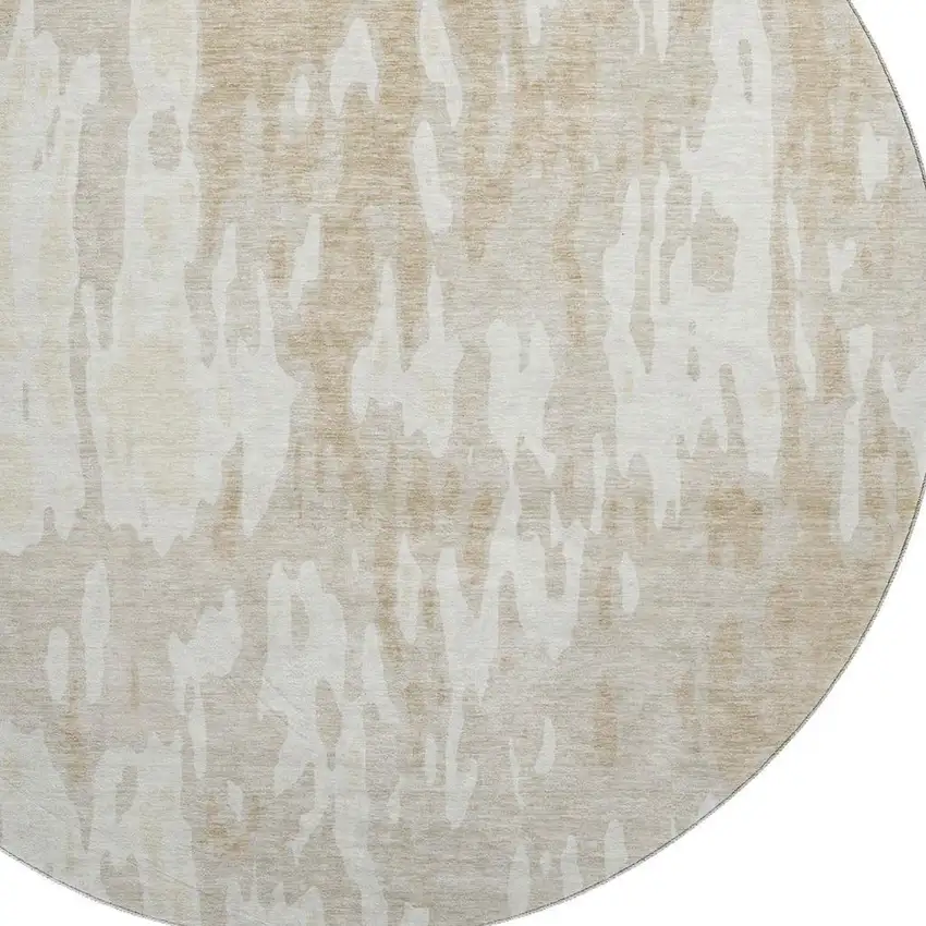 8' Beige Ivory And Tan Abstract Washable Round Rug With UV Protection Photo 2