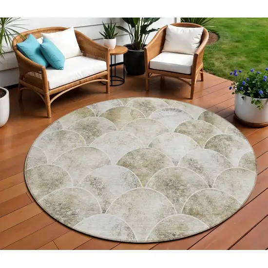 8' Beige Ivory And Tan Round Abstract Washable Indoor Outdoor Area Rug Photo 1