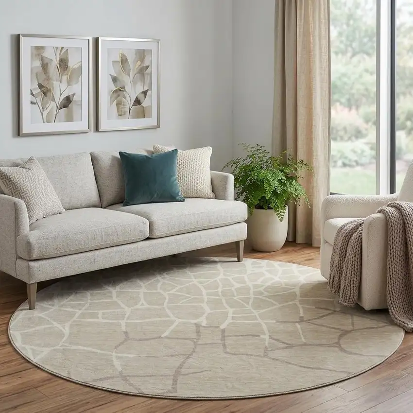 8' Beige Ivory And Taupe Abstract Geometric Washable Round Rug With UV Protection Photo 1
