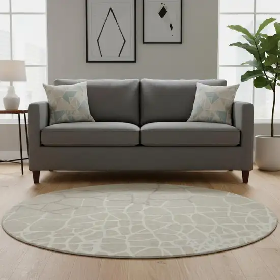 8' Beige Ivory And Taupe Abstract Geometric Washable Round Rug With UV Protection Photo 2