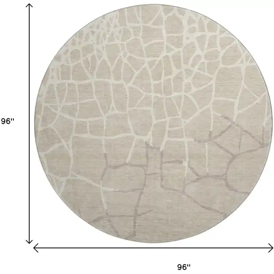 8' Beige Ivory And Taupe Abstract Geometric Washable Round Rug With UV Protection Photo 9