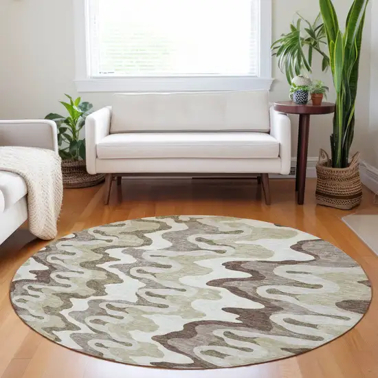 8' Beige Ivory And Taupe Abstract Washable Round Rug With UV Protection Photo 5