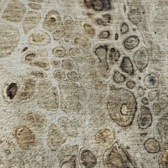 8' Beige Ivory And Taupe Abstract Washable Round Rug With UV Protection Photo 9