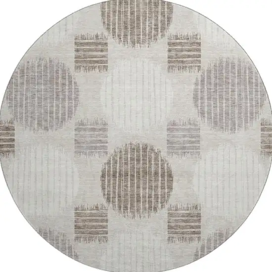 8' Beige Ivory And Taupe Geometric Washable Round Rug With UV Protection Photo 4