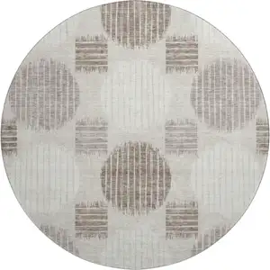Photo of 8' Beige Ivory And Taupe Geometric Washable Round Rug With UV Protection