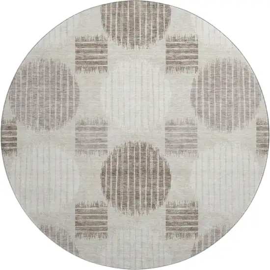 8' Beige Ivory And Taupe Geometric Washable Round Rug With UV Protection Photo 1
