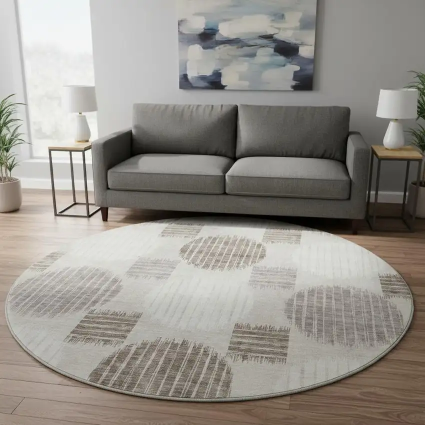 8' Beige Ivory And Taupe Geometric Washable Round Rug With UV Protection Photo 2