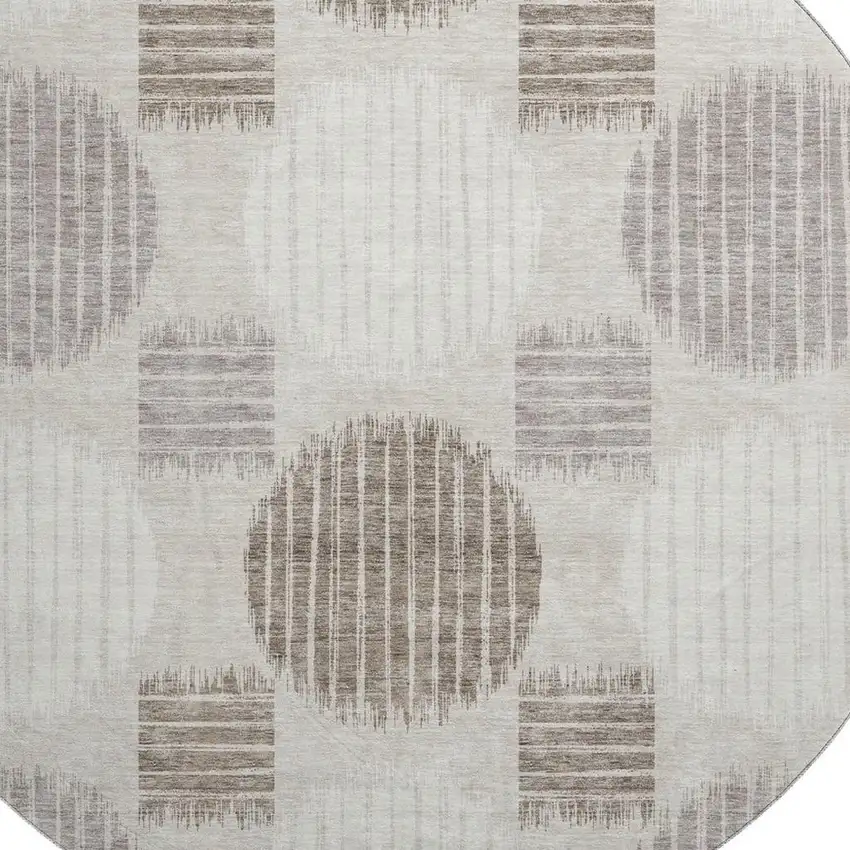 8' Beige Ivory And Taupe Geometric Washable Round Rug With UV Protection Photo 3