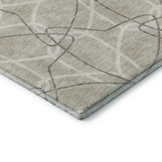 8' Beige Ivory And Taupe Geometric Washable Round Rug With UV Protection Photo 7