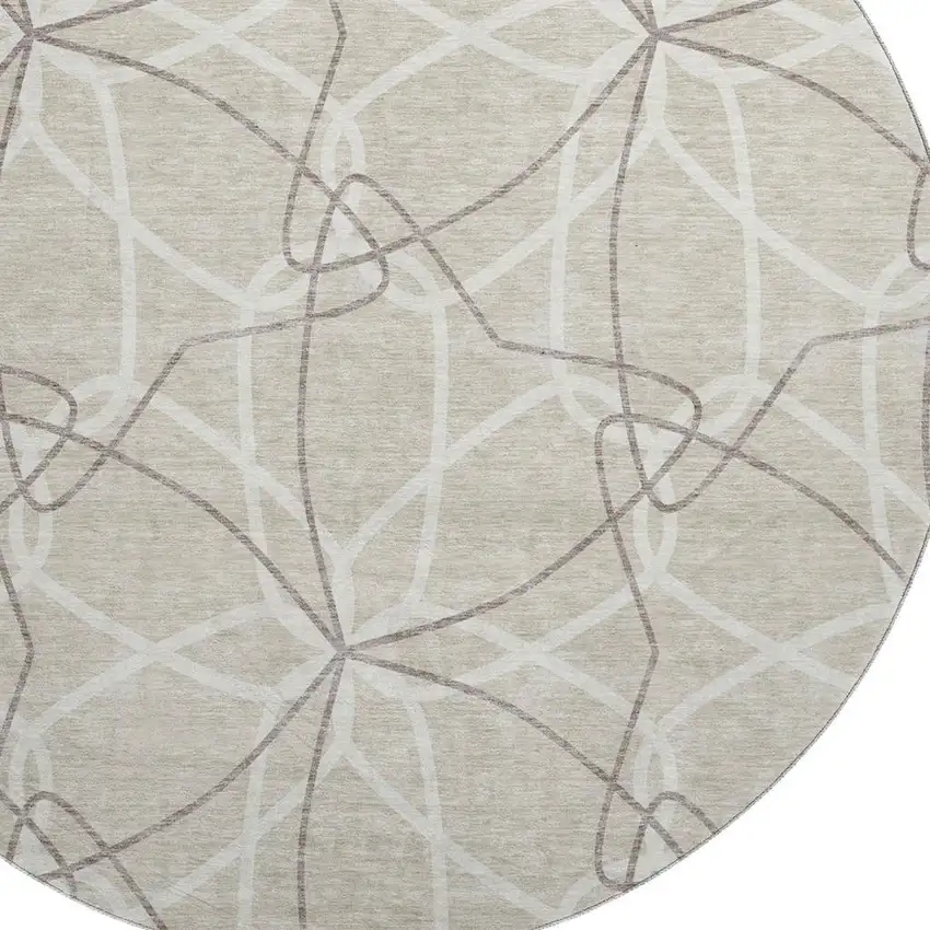 8' Beige Ivory And Taupe Geometric Washable Round Rug With UV Protection Photo 2