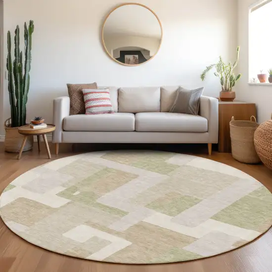 8' Beige Ivory And Taupe Geometric Washable Round Rug With UV Protection Photo 4