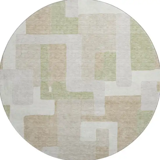 8' Beige Ivory And Taupe Geometric Washable Round Rug With UV Protection Photo 3
