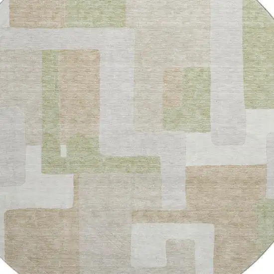 8' Beige Ivory And Taupe Geometric Washable Round Rug With UV Protection Photo 2