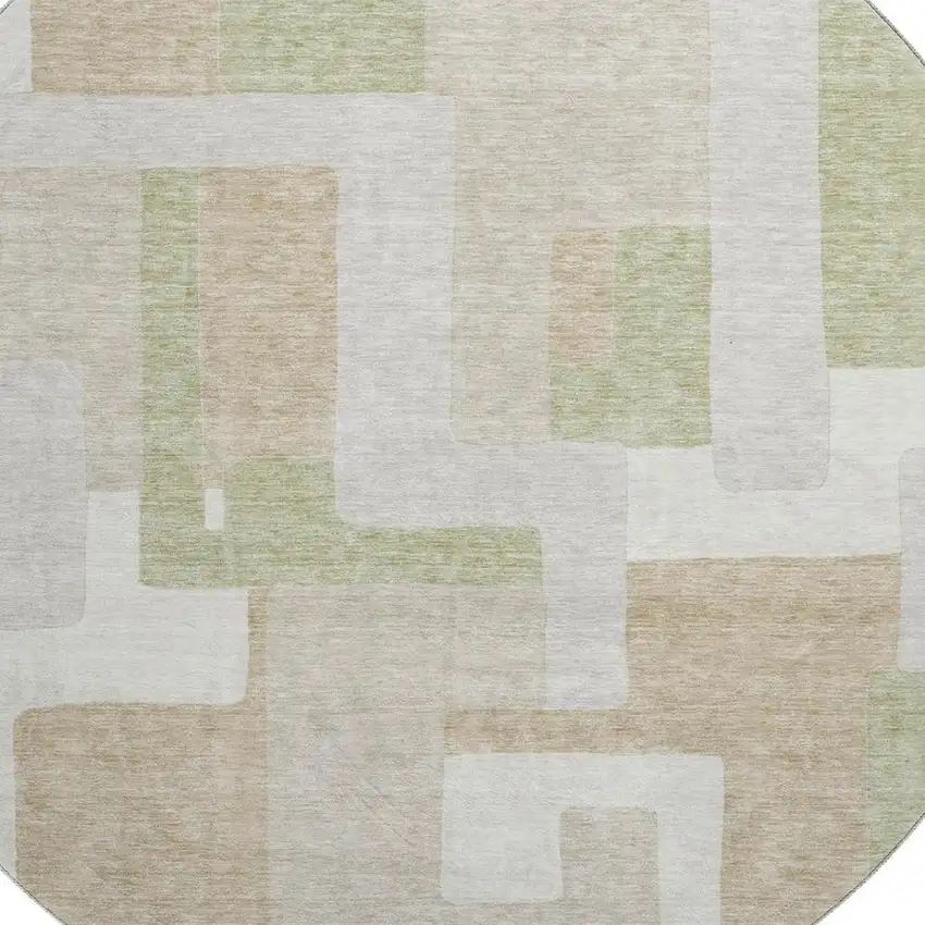 8' Beige Ivory And Taupe Geometric Washable Round Rug With UV Protection Photo 2