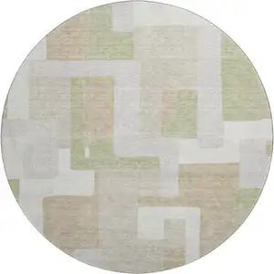 Photo of 8' Beige Ivory And Taupe Geometric Washable Round Rug With UV Protection