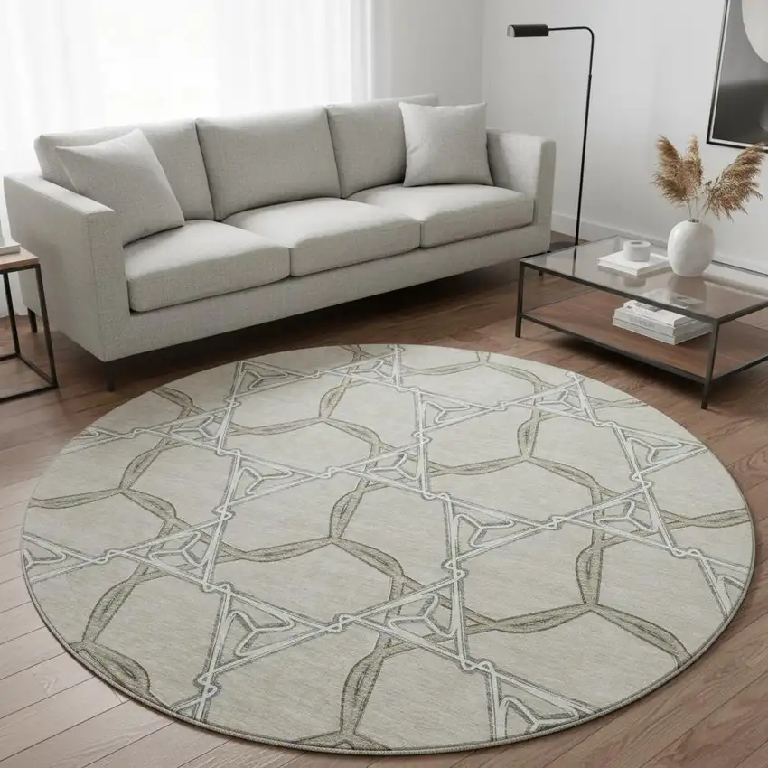 8' Beige Ivory And Taupe Geometric Washable Round Rug With UV Protection Photo 2