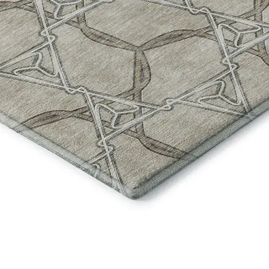 8' Beige Ivory And Taupe Geometric Washable Round Rug With UV Protection Photo 6