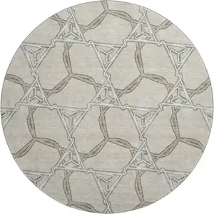 Photo of 8' Beige Ivory And Taupe Geometric Washable Round Rug With UV Protection