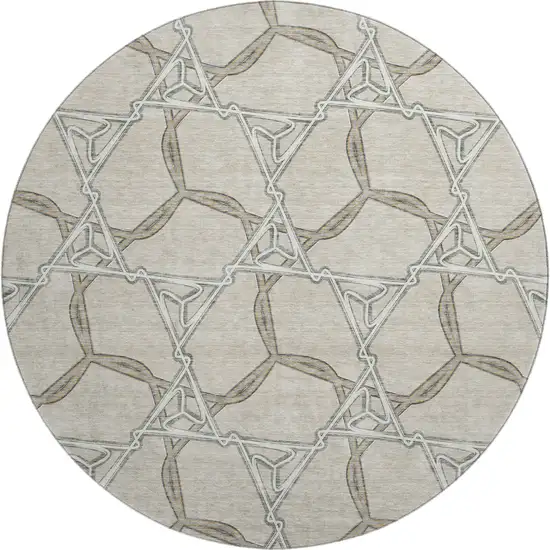 8' Beige Ivory And Taupe Geometric Washable Round Rug With UV Protection Photo 1