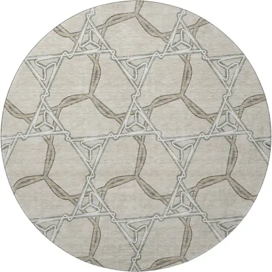 8' Beige Ivory And Taupe Geometric Washable Round Rug With UV Protection Photo 3