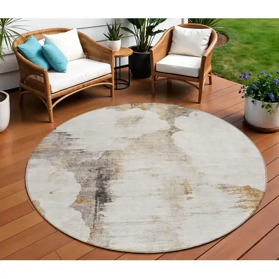 8' Beige Ivory And Taupe Round Abstract Washable Indoor Outdoor Area Rug Photo 1