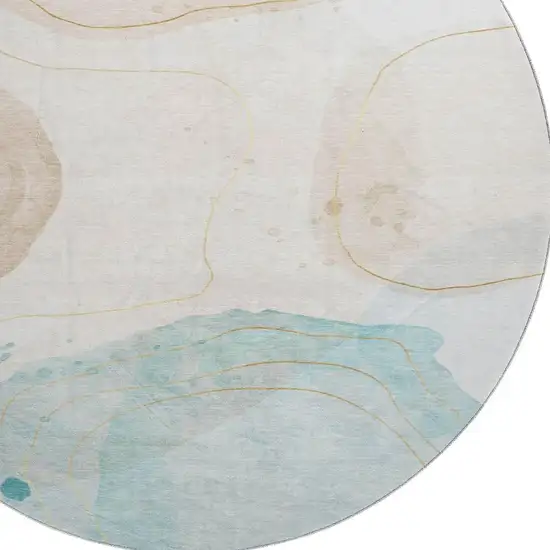 8' Beige Ivory And Teal Abstract Washable Round Rug With UV Protection Photo 3