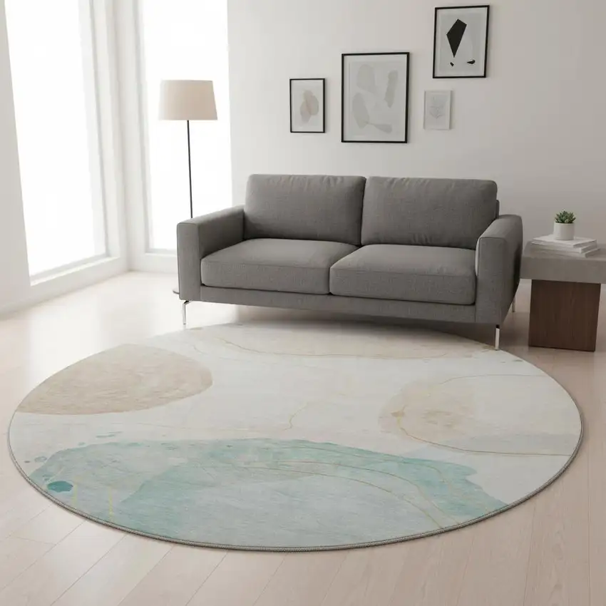 8' Beige Ivory And Teal Abstract Washable Round Rug With UV Protection Photo 2
