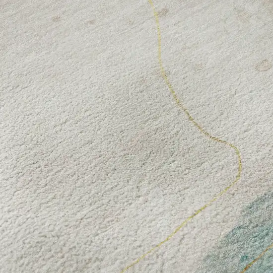 8' Beige Ivory And Teal Abstract Washable Round Rug With UV Protection Photo 9