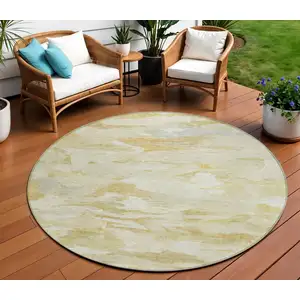 Photo of 8' Beige Light Green And Brown Round Abstract Washable Indoor Outdoor Area Rug