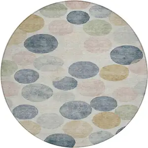 Photo of 8' Beige Navy Blue And Gold Round Geometric Washable Indoor Outdoor Area Rug