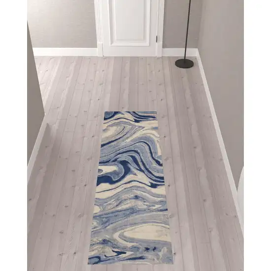 8' Beige Navy Blue And Light Blue Abstract Non Skid Runner Rug Photo 1
