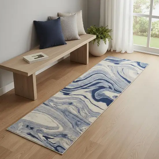 6' Beige Navy Blue And Light Blue Abstract Non Skid Runner Rug Photo 1