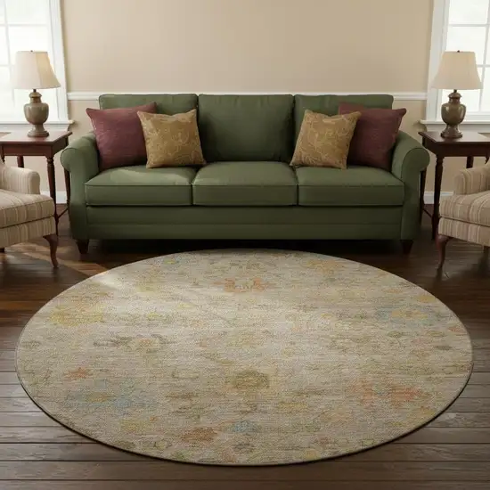 8' Beige Orange And Blue Floral Washable Round Rug With UV Protection Photo 2
