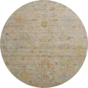 Photo of 8' Beige Orange And Blue Floral Washable Round Rug With UV Protection