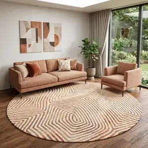 Photo of 8' Beige Orange And Brown Geometric Washable Round Rug With UV Protection