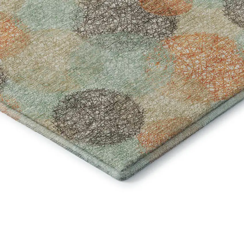 8' Beige Orange And Ivory Abstract Washable Round Rug With UV Protection Photo 6