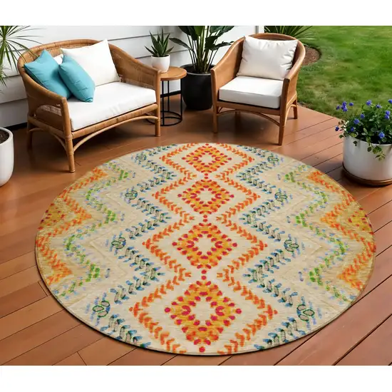 8' Beige Orange And Red Round Geometric Washable Indoor Outdoor Area Rug Photo 1