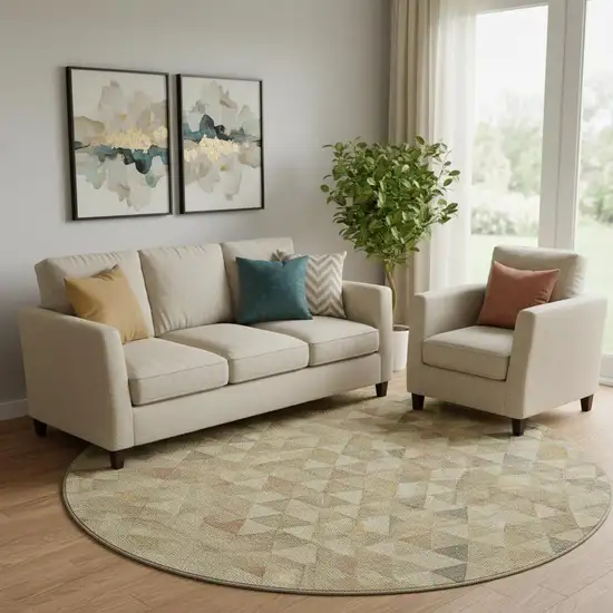 8' Beige Red And Salmon Geometric Washable Round Rug With UV Protection Photo 1