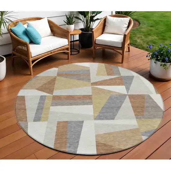 8' Beige Rust And Taupe Round Geometric Washable Indoor Outdoor Area Rug Photo 1
