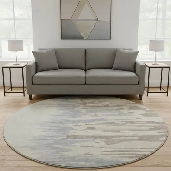 8' Beige Silver And Gray Abstract Washable Round Rug With UV Protection Photo 2