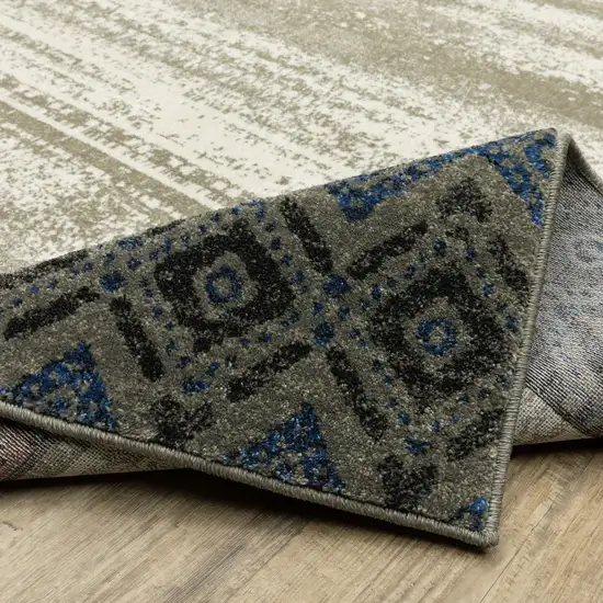 8' Beige Tan And Dark Blue Patchwork Runner Rug Photo 9