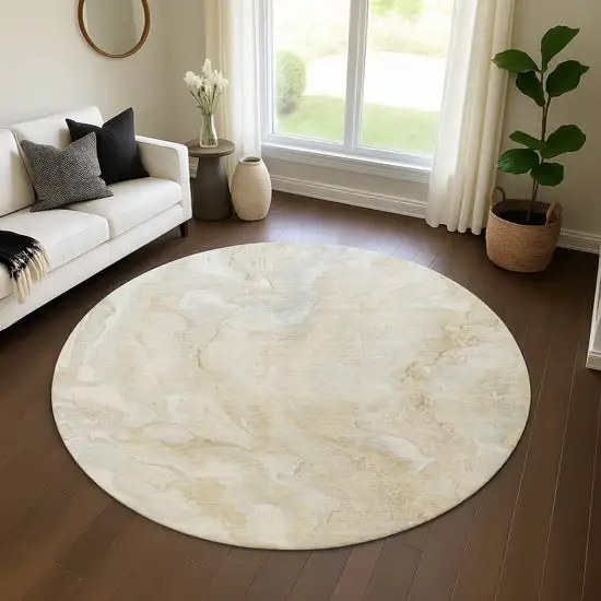 8' Beige Tan And Ivory Abstract Washable Round Rug With UV Protection Photo 4