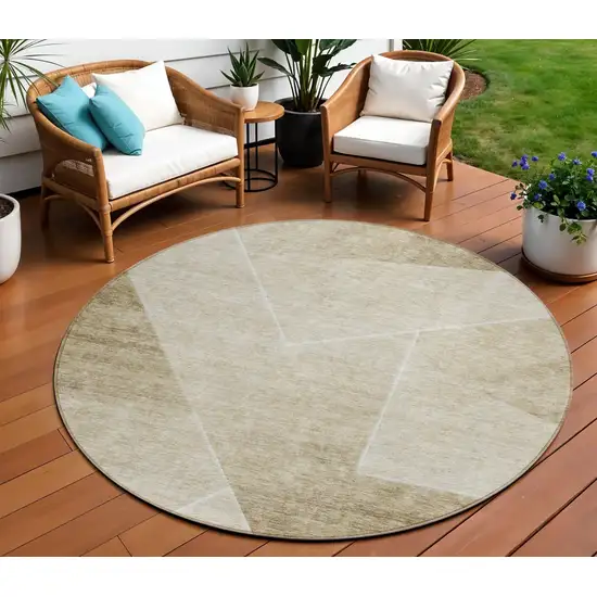 8' Beige Tan And Ivory Round Abstract Washable Indoor Outdoor Area Rug Photo 1